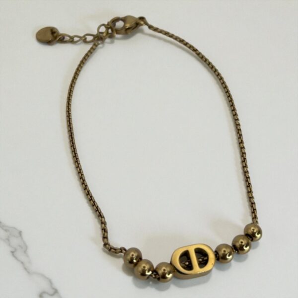 Bracelet CD Perles Dorées