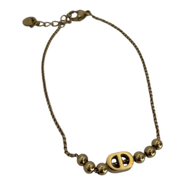 Bracelet CD Perles Dorées