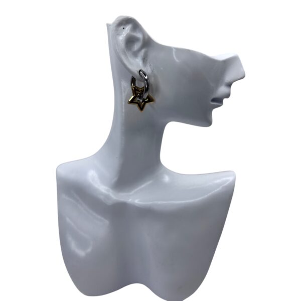 Boucles d'oreilles pendantes scintillantes en forme d'étoile